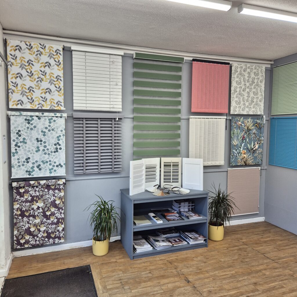 Blind display showroom in Cambridge showcasing made to measure roller, Venetian and Roman blinds.