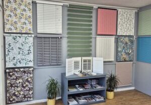 Blind display showroom in Cambridge showcasing made to measure roller, Venetian and Roman blinds.