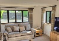 Made-to-measure curtains installed in a Cambridge home, enhancing warmth, privacy and interior style.